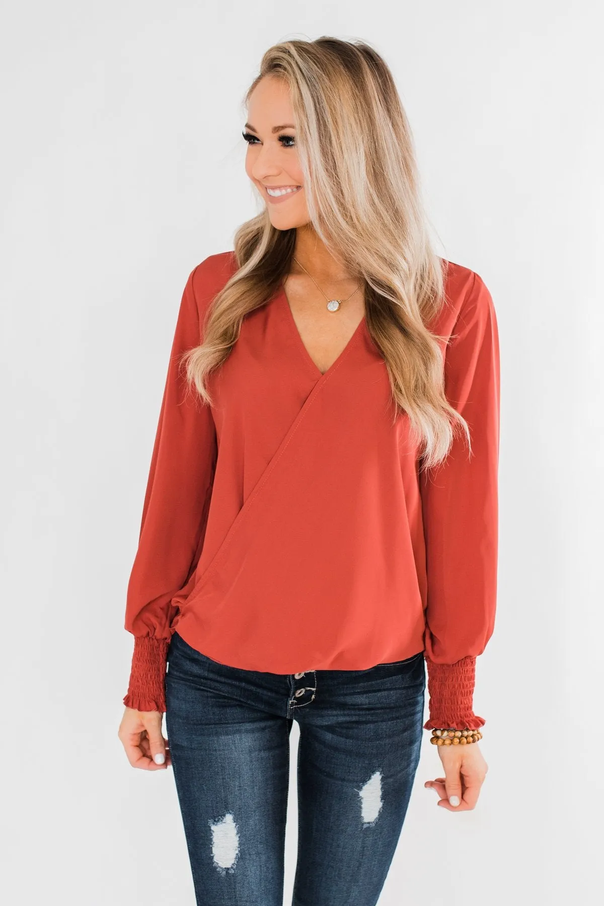 Keeping Up With Cute Wrap Blouse- Rust