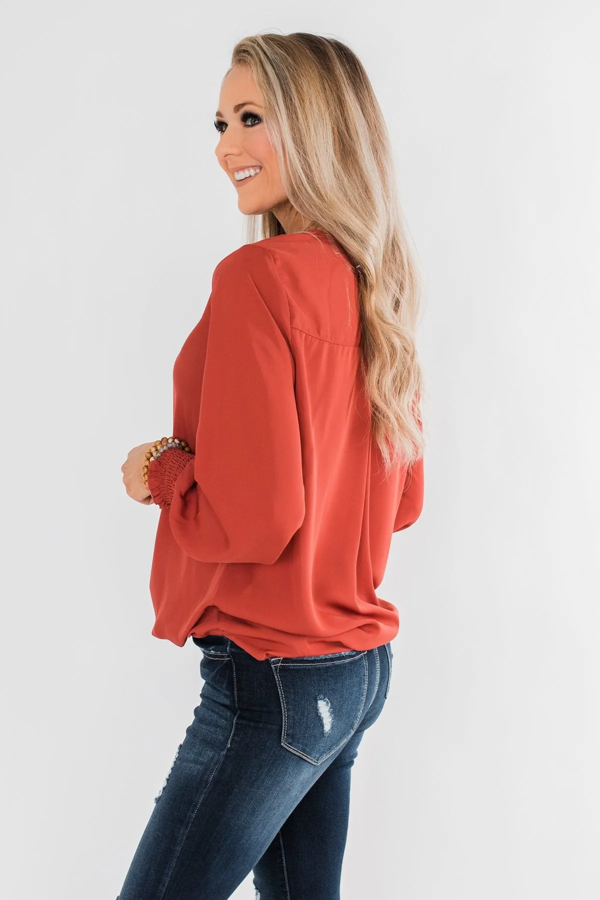 Keeping Up With Cute Wrap Blouse- Rust