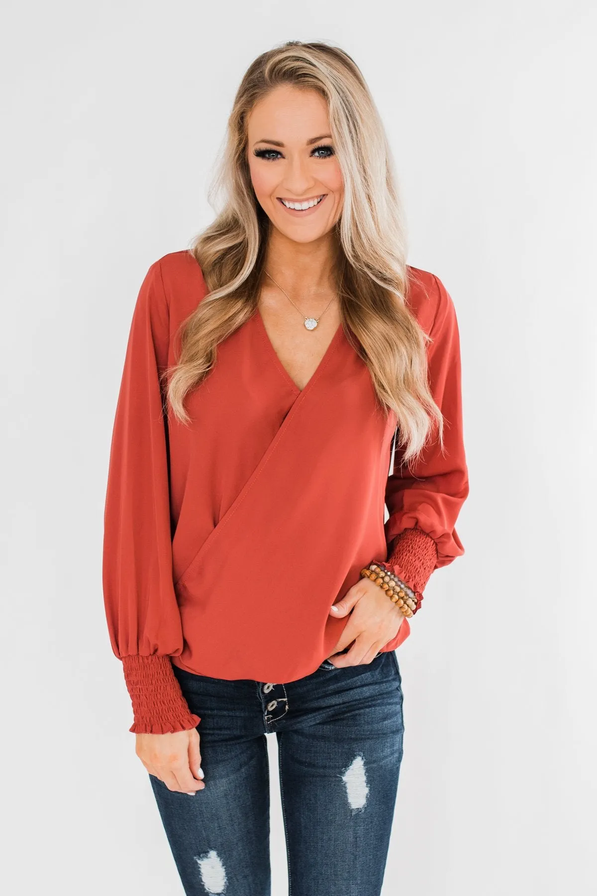 Keeping Up With Cute Wrap Blouse- Rust