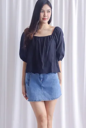 Sherlyn Eyelet Puffy Sleeve Top In Black